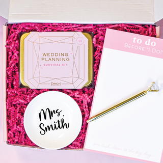 a wedding planning box gift set with ring dish notepad and wedding planning survival kit for newly engaged person